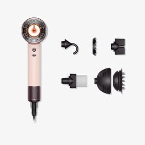 Dyson Hair Dryer in Light Pink with Dark Nickel Accents and Black Attachments